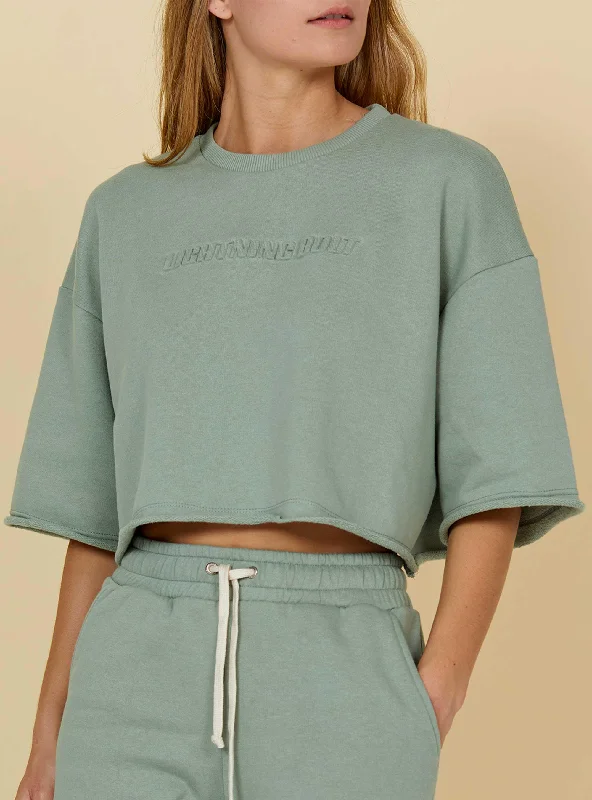 T-SHIRT CURTA COM BAINHA CRUA Front Pockets Side Pockets Patch Pockets
